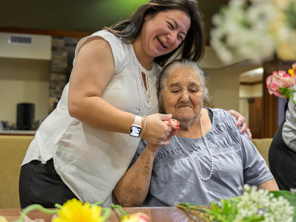 Caledonia Senior Living and Memory Care Team with Resident