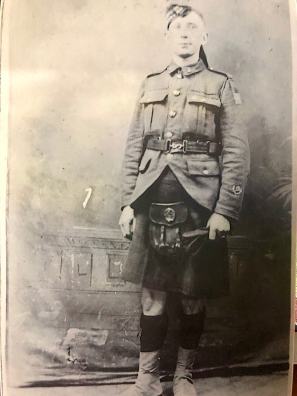 From the Summer Picnic to the Front Lines: Honoring the Legacy of John Cyril Robertson on Veteran’s Day