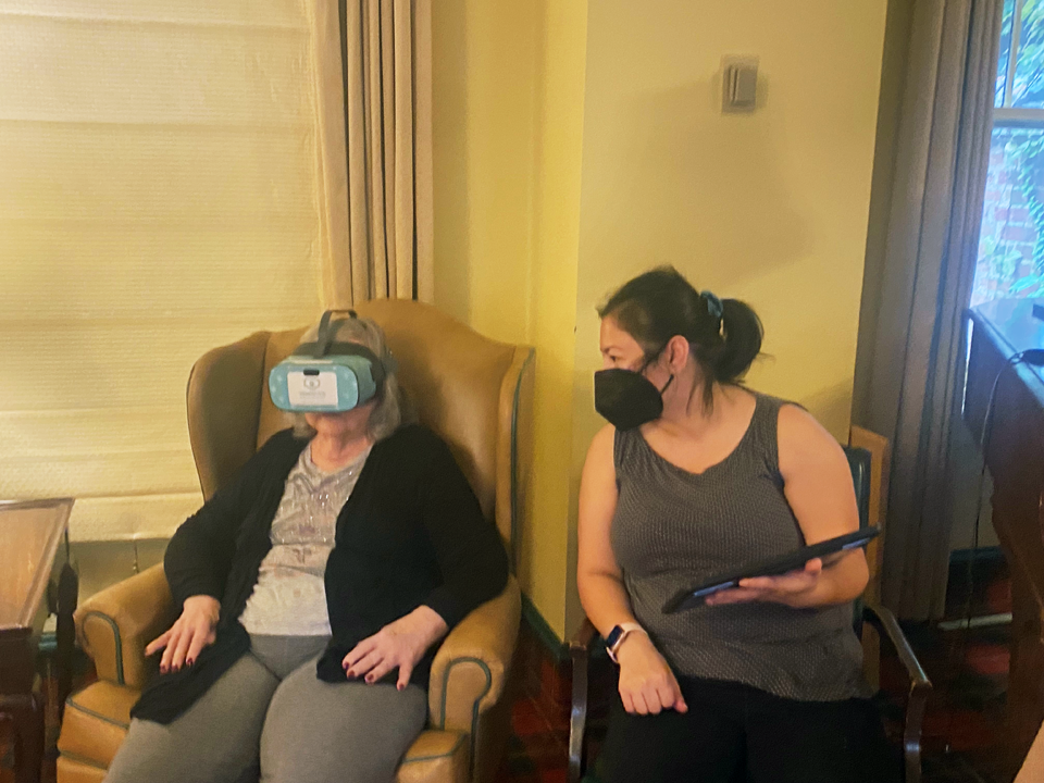 Resident using Rendever Virtual Reality Set